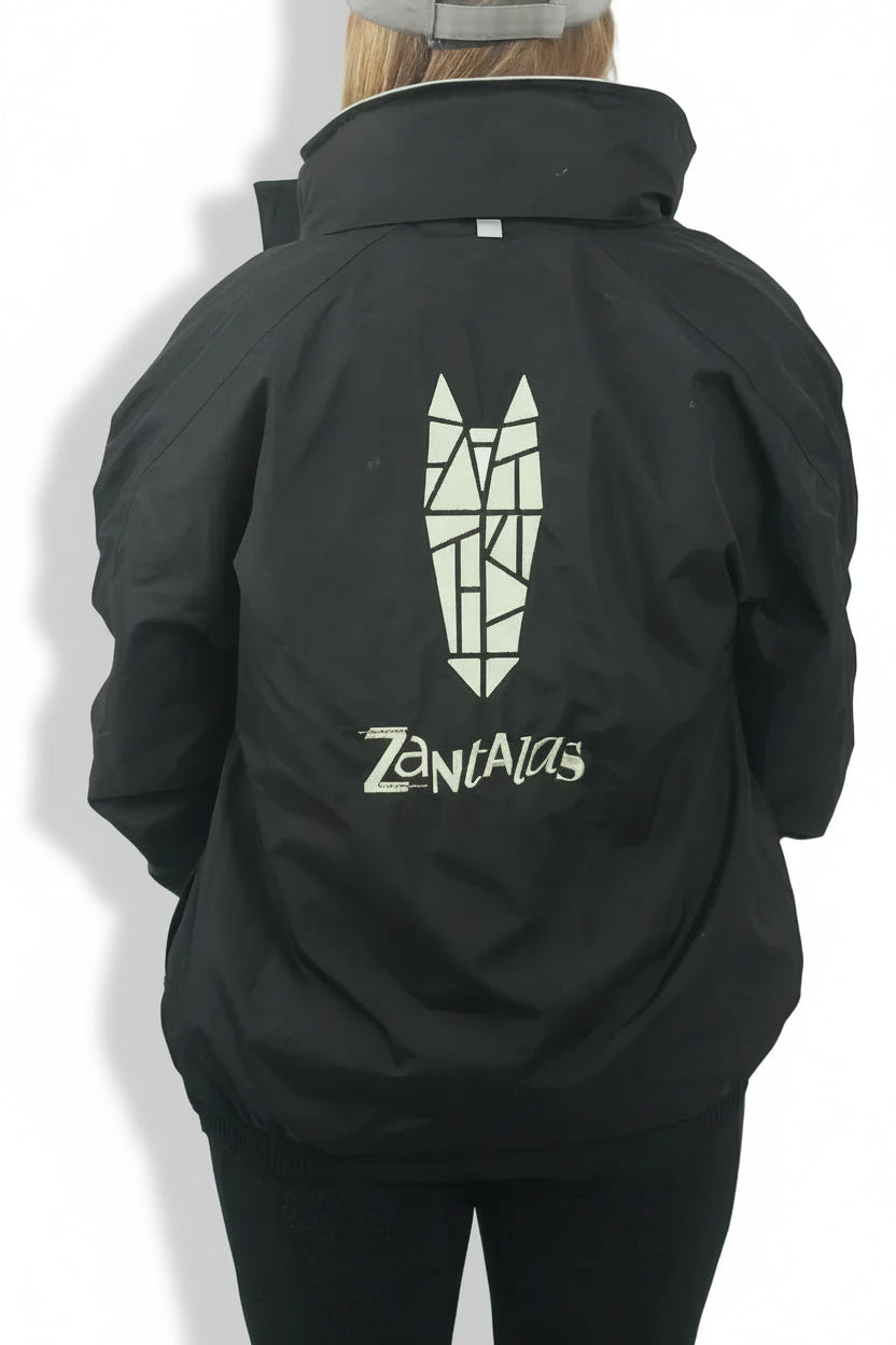 Rear view of a black equestrian waterproof bomber jacket with a fashionable and striking silver green horse head logo